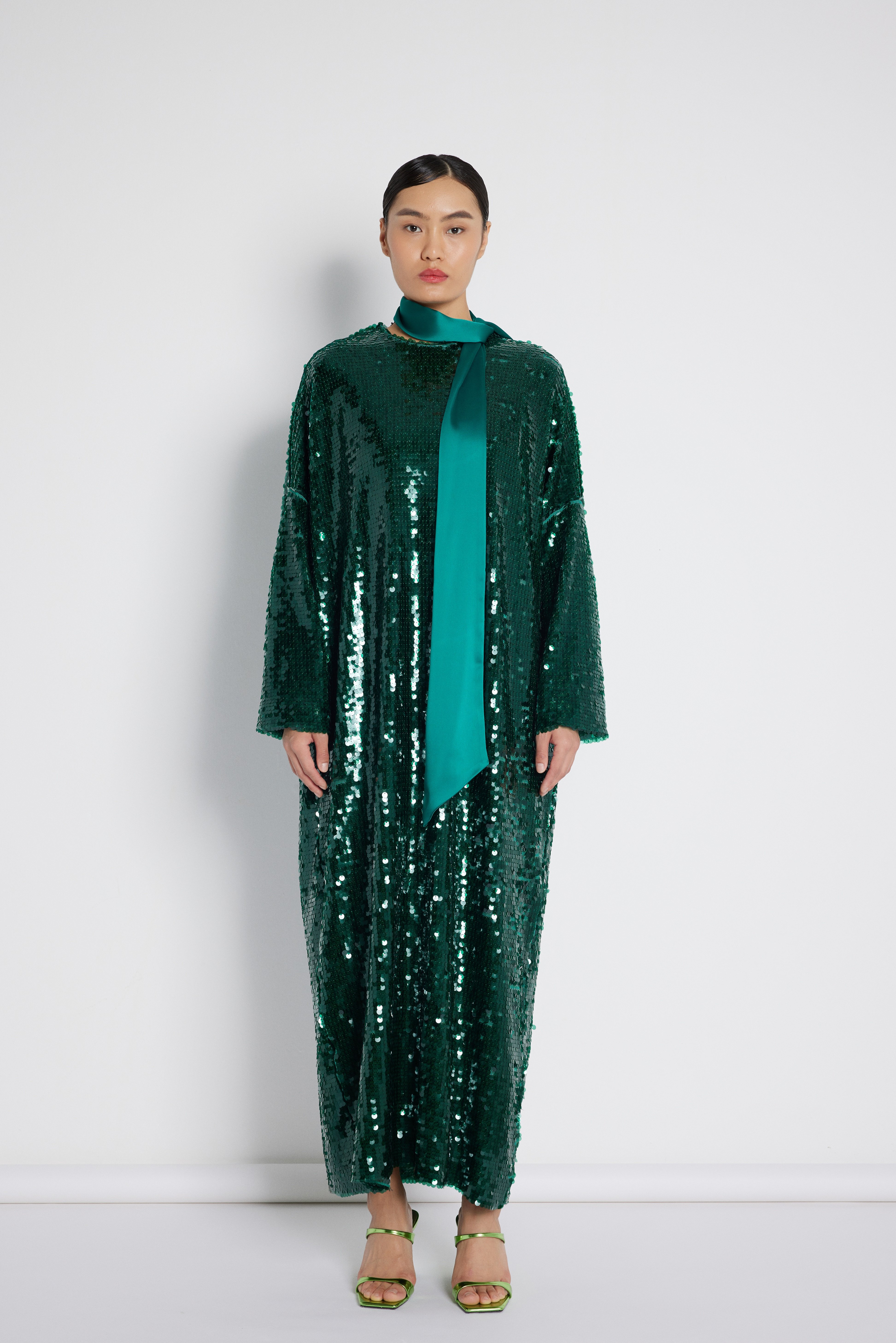 Robe en tissu à sequins vert émeraude